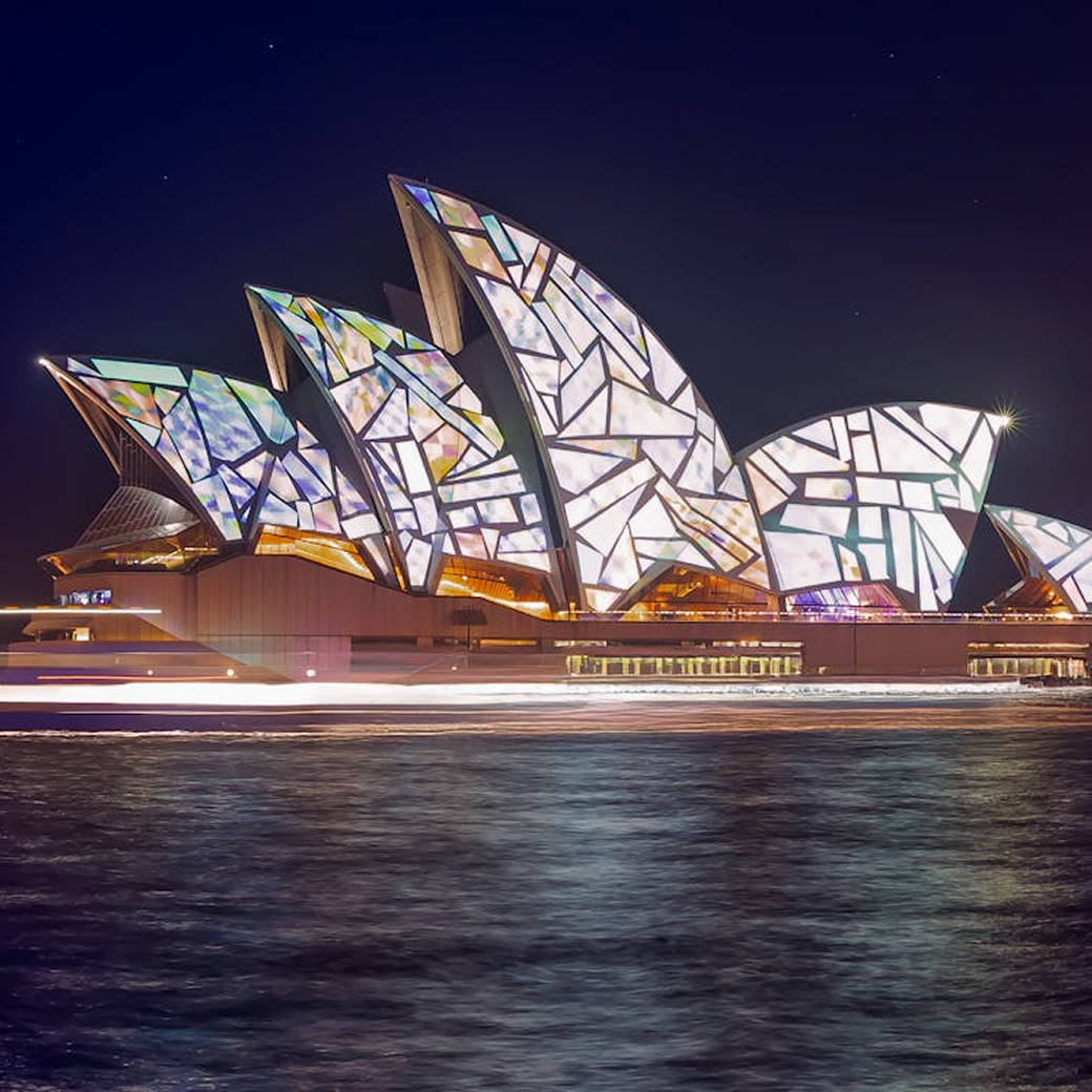 Sydney Opera House lit up at night